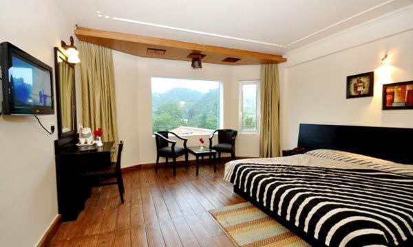 Hotel Suman Paradise Naini Tāl Quarto foto